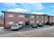 Brick apartment building with ample parking and a well-maintained exterior at 1705 Monroe Ne Dr # B05, Atlanta, GA 30324