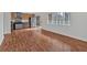 Spacious living area with hardwood floors and natural light at 1705 Monroe Ne Dr # B05, Atlanta, GA 30324