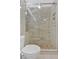 Large walk-in shower with glass enclosure and stone tile at 1705 Monroe Ne Dr # B05, Atlanta, GA 30324