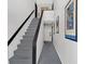 Clean and well-lit apartment stairwell with carpeted floors at 1705 Monroe Ne Dr # B05, Atlanta, GA 30324