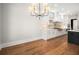 Spacious dining area with hardwood floors and chandelier at 2675 S Bamby Ne Ln, Brookhaven, GA 30319