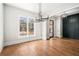 Bright dining room with hardwood floors, large windows, and a dramatic chandelier at 2675 S Bamby Ne Ln, Brookhaven, GA 30319