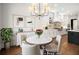 Elegant dining area with round table and chandelier at 2675 S Bamby Ne Ln, Brookhaven, GA 30319