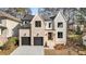 Stunning two-story home with a brick facade and a two-car garage at 2675 S Bamby Ne Ln, Brookhaven, GA 30319