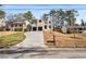 House exterior showcasing driveway and landscaping at 2675 S Bamby Ne Ln, Brookhaven, GA 30319