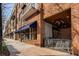 Brick building with a blue awning and outdoor seating at 2675 S Bamby Ne Ln, Brookhaven, GA 30319