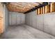 Unfinished basement room with concrete floor and exposed framing at 2675 S Bamby Ne Ln, Brookhaven, GA 30319