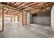 Spacious unfinished basement with concrete floor and framing at 2675 S Bamby Ne Ln, Brookhaven, GA 30319