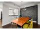 Elegant dining room with wood table, geometric wallpaper, and chandelier at 3047 Lenox Ne Rd # 1108, Atlanta, GA 30324