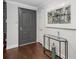 Spacious entryway with dark gray door and a glass-top console table at 3047 Lenox Ne Rd # 1108, Atlanta, GA 30324