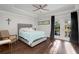 Main bedroom with hardwood floors and access to private patio at 3047 Lenox Ne Rd # 1108, Atlanta, GA 30324