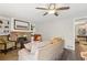 Bright living room with hardwood floors and fireplace at 409 Katherine Ln, Woodstock, GA 30189