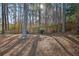 Wooded backyard with a privacy fence at 436 Suwanee East Dr, Lawrenceville, GA 30043