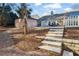 Stone steps leading to the backyard patio area at 436 Suwanee East Dr, Lawrenceville, GA 30043