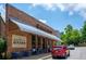 Blue Eyed Daisy Bakery exterior with outdoor seating at 9032 Selborne Ln, Chattahoochee Hills, GA 30268