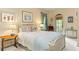 Cozy bedroom with a queen bed and garden view at 9032 Selborne Ln, Chattahoochee Hills, GA 30268