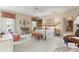 Spacious bedroom with iron bed frame and window seating at 9032 Selborne Ln, Chattahoochee Hills, GA 30268