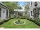 Landscaped garden with circular design and stone pathway at 9032 Selborne Ln, Chattahoochee Hills, GA 30268