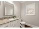 Well-appointed bathroom with granite countertop and updated fixtures at 2480 Magnolia Ridge Se Dr, Marietta, GA 30067