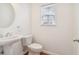 Simple and clean half bathroom with pedestal sink at 3136 Mercer University Dr # 6, Chamblee, GA 30341