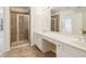 Bathroom with double vanity, shower, and tile flooring at 3136 Mercer University Dr # 6, Chamblee, GA 30341