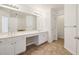 Double vanity bathroom with a large mirror and tile flooring at 3136 Mercer University Dr # 6, Chamblee, GA 30341