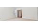 Spacious bedroom with hardwood floors and access to hallway at 3136 Mercer University Dr # 6, Chamblee, GA 30341