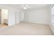 Spacious bedroom with neutral carpeting and an ensuite bathroom at 3136 Mercer University Dr # 6, Chamblee, GA 30341