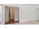 Bright bedroom with hardwood floors and access to hallway at 3136 Mercer University Dr # 6, Chamblee, GA 30341