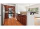 Stainless steel appliances and dark wood cabinets in kitchen at 3136 Mercer University Dr # 6, Chamblee, GA 30341