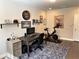 Home office or exercise room with Peloton bike and desk at 4743 Roswell Rd, Atlanta, GA 30342