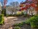 Shared courtyard with brick pavement and lush landscaping at 855 Greenwood Ne Ave # E, Atlanta, GA 30306