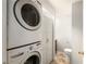 Stackable LG washer and dryer in laundry room at 855 Greenwood Ne Ave # E, Atlanta, GA 30306