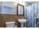 Clean bathroom with pedestal sink and shower/tub combo at 2384 Bradcliff Ne Dr, Atlanta, GA 30345