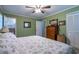 Main bedroom with floral bedding and ample closet space at 2384 Bradcliff Ne Dr, Atlanta, GA 30345