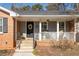 Inviting front porch with rocking chairs and wreath at 2384 Bradcliff Ne Dr, Atlanta, GA 30345