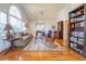 Bright living room with hardwood floors, large windows and comfortable seating at 2384 Bradcliff Ne Dr, Atlanta, GA 30345