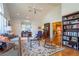 Spacious living room with hardwood floors, built-in shelving and a cozy sitting area at 2384 Bradcliff Ne Dr, Atlanta, GA 30345