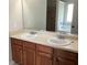 Double vanity bathroom with a large mirror and soaking tub at 252 Magnaview Dr, Mcdonough, GA 30253