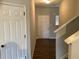 Bright entryway with stairs and coat closet at 252 Magnaview Dr, Mcdonough, GA 30253