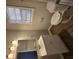 Clean bathroom with white vanity and fixtures at 258 Pickett Bridge Rd, Covington, GA 30016