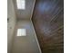 Spacious bedroom featuring wood-look floors and neutral walls at 258 Pickett Bridge Rd, Covington, GA 30016