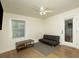 Bedroom with sofa bed, coffee table and hardwood floors at 679 Montevista St, Atlanta, GA 30310