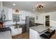 Modern kitchen with stainless steel appliances and a large kitchen island at 679 Montevista St, Atlanta, GA 30310