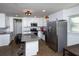 Modern kitchen with stainless steel appliances and a large kitchen island at 679 Montevista St, Atlanta, GA 30310