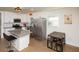 Modern kitchen with stainless steel appliances and a large kitchen island at 679 Montevista St, Atlanta, GA 30310