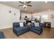 Open concept living room and kitchen with hardwood floors and modern decor at 679 Montevista St, Atlanta, GA 30310