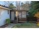 Inviting screened porch, perfect for relaxing outdoors at 679 Montevista St, Atlanta, GA 30310