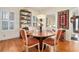 Bright dining room with round table, hardwood floors and view into living room at 824 Amsterdam Ne Ave, Atlanta, GA 30306