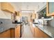 Modern kitchen with light wood cabinets and gray counters at 824 Amsterdam Ne Ave, Atlanta, GA 30306